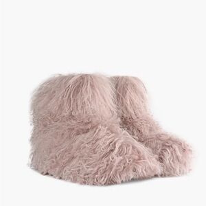 Never worn - Ugg classic short fluff boot.